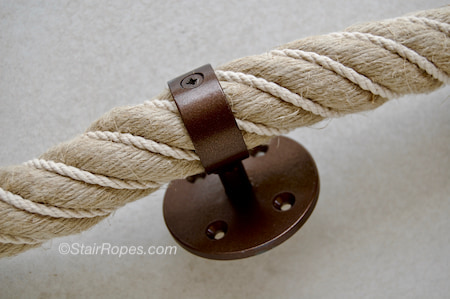 Wrought iron fitting for rope railing in antique bronze finish Wrought iron fitting for rope railing in antique bronze finish