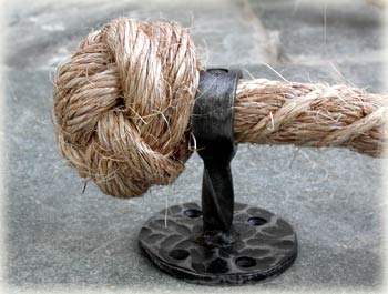 2 ply knot on special manila stair rope hammered finish wrought iron bracket.