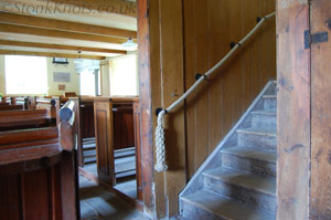 Hemp rope handrails with hammered finish iron fittings and crown plait endings