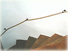 cottage stair rope - hemp rope wrought iron brackets